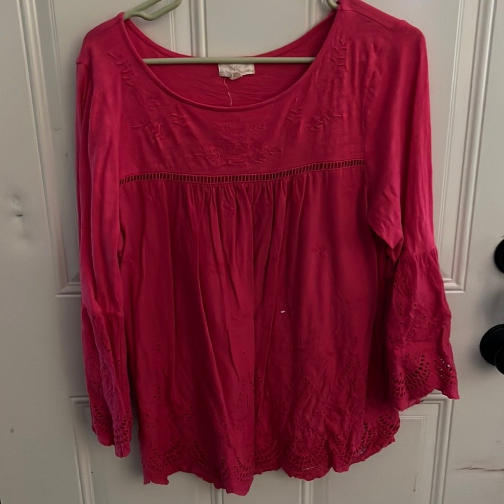 Beautiful pink top with bell sleeve at bottom